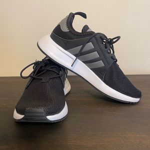 Adidas tennis shoes. Size 4.5 kids. Size 6 women.